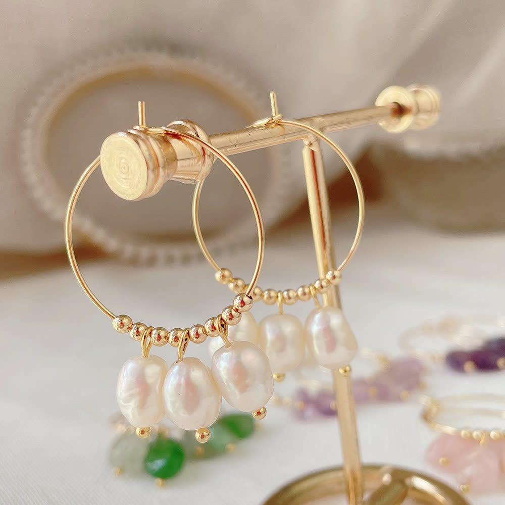 Boucles d'oreilles pendantes en acier titane et cristal concassé naturel Olivenorma