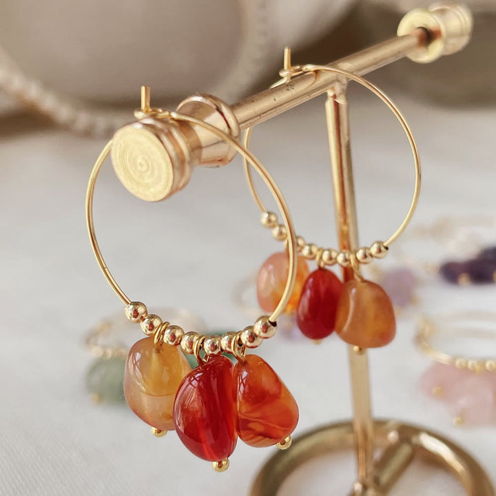 Boucles d'oreilles pendantes en acier titane et cristal concassé naturel Olivenorma