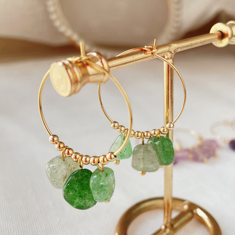 Boucles d'oreilles pendantes en acier titane et cristal concassé naturel Olivenorma
