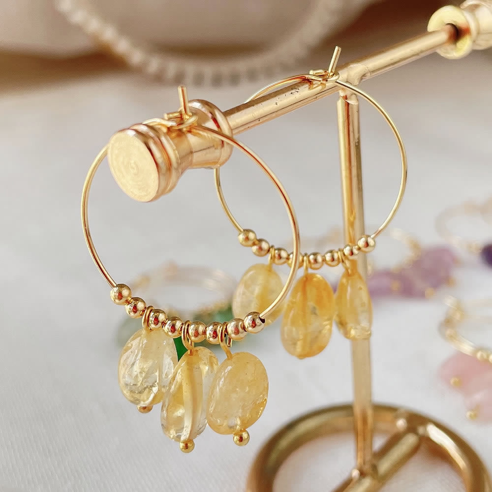 Boucles d'oreilles pendantes en acier titane et cristal concassé naturel Olivenorma