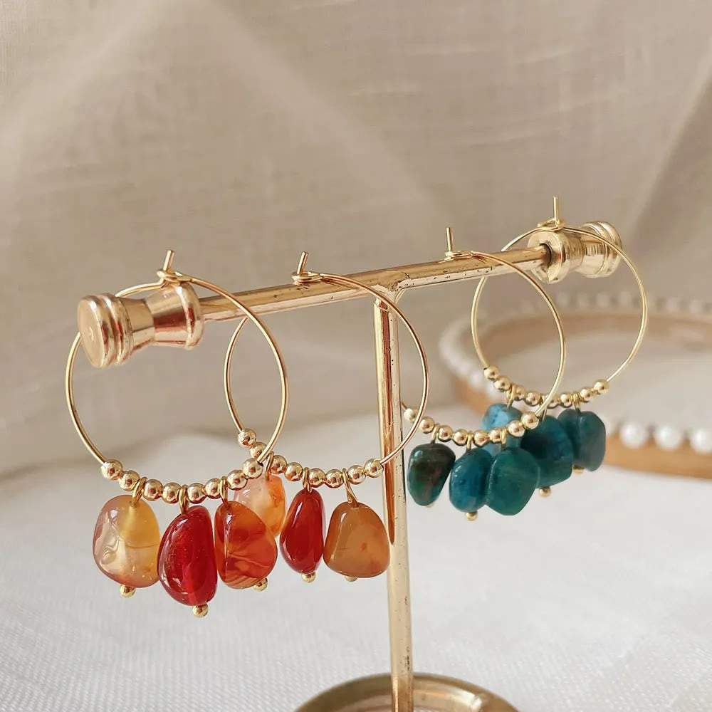 Boucles d'oreilles pendantes en acier titane et cristal concassé naturel Olivenorma