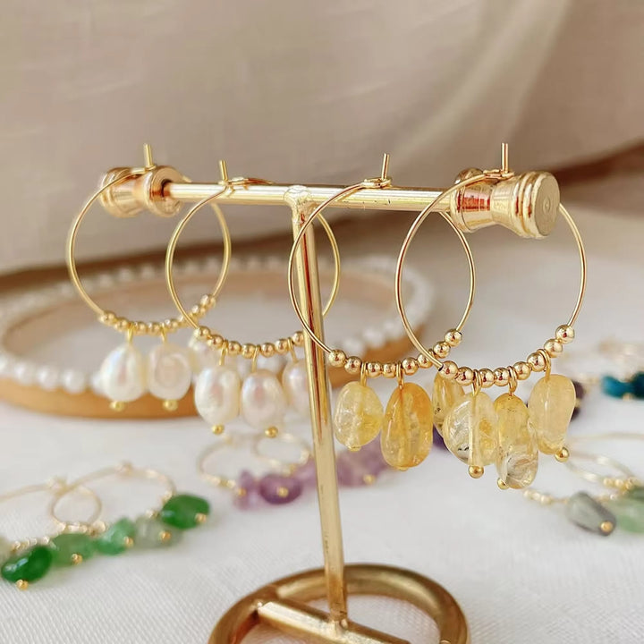 Boucles d'oreilles pendantes en acier titane et cristal concassé naturel Olivenorma