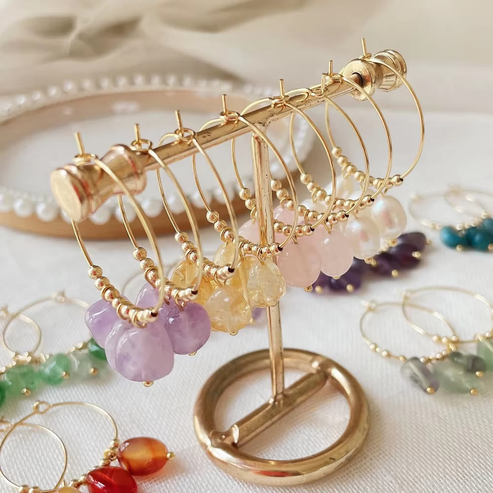Boucles d'oreilles pendantes en acier titane et cristal concassé naturel Olivenorma