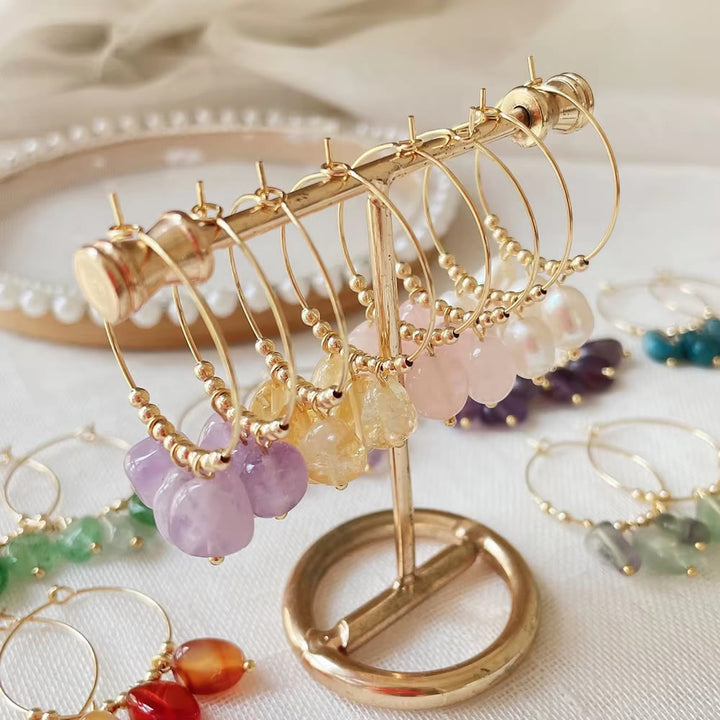 Boucles d'oreilles pendantes en acier titane et cristal concassé naturel Olivenorma