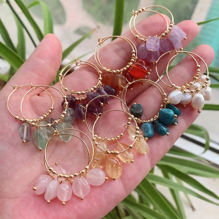Boucles d'oreilles pendantes en acier titane et cristal concassé naturel Olivenorma