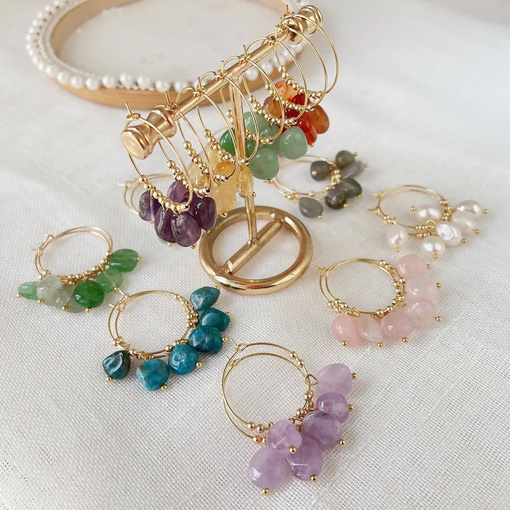 Boucles d'oreilles pendantes en acier titane et cristal concassé naturel Olivenorma
