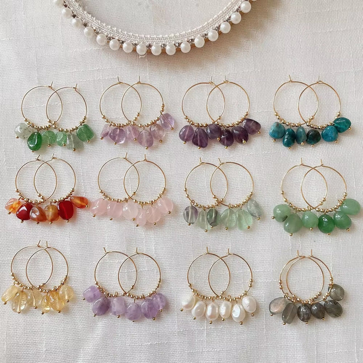 Boucles d'oreilles pendantes en acier titane et cristal concassé naturel Olivenorma