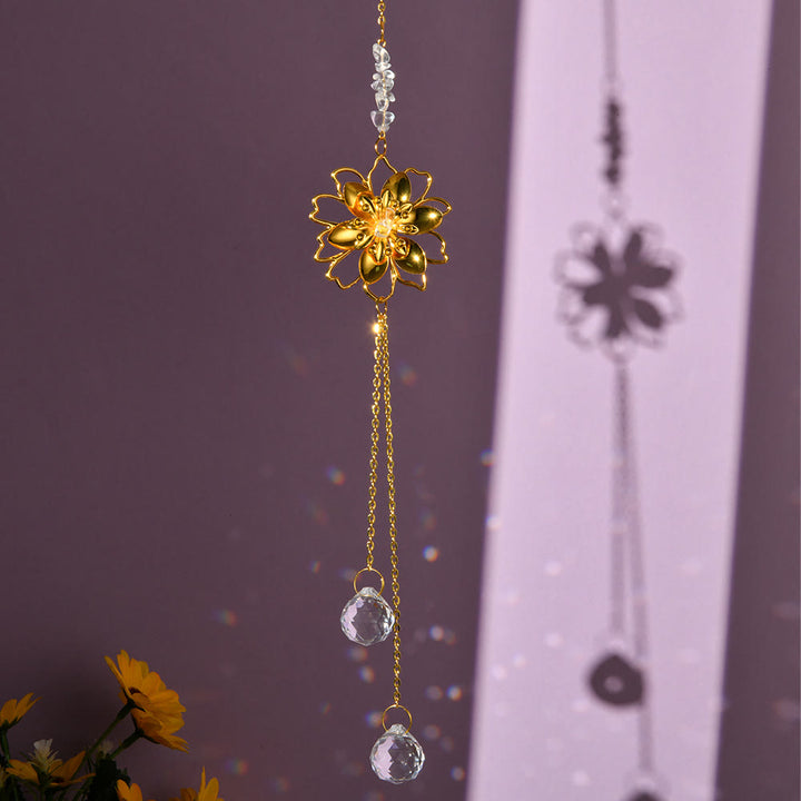 Pendentif attrape-soleil en gravier naturel avec lotus Olivenorma