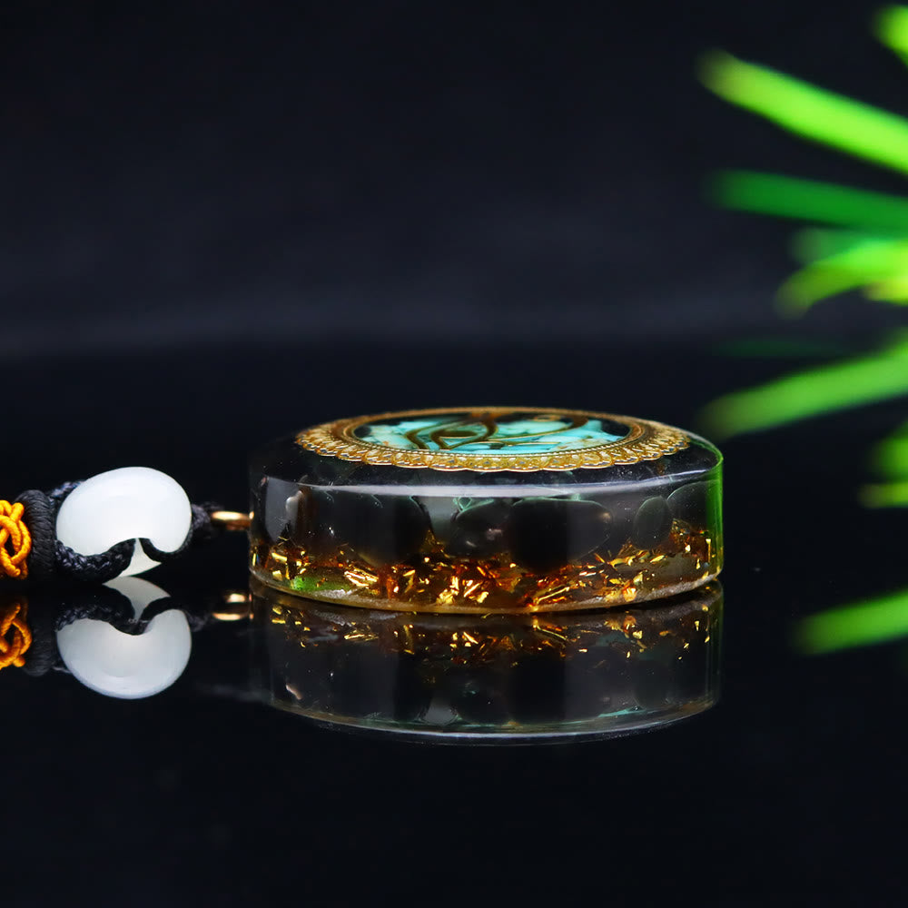 Collier orgonite époxy Olivenorma en onyx noir et turquoise