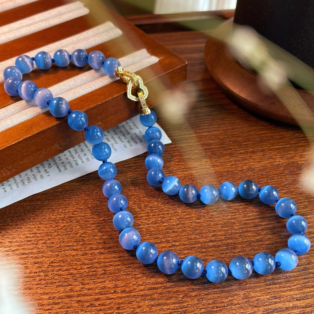Collier de perles en pierre œil de chat bleu Olivenorma