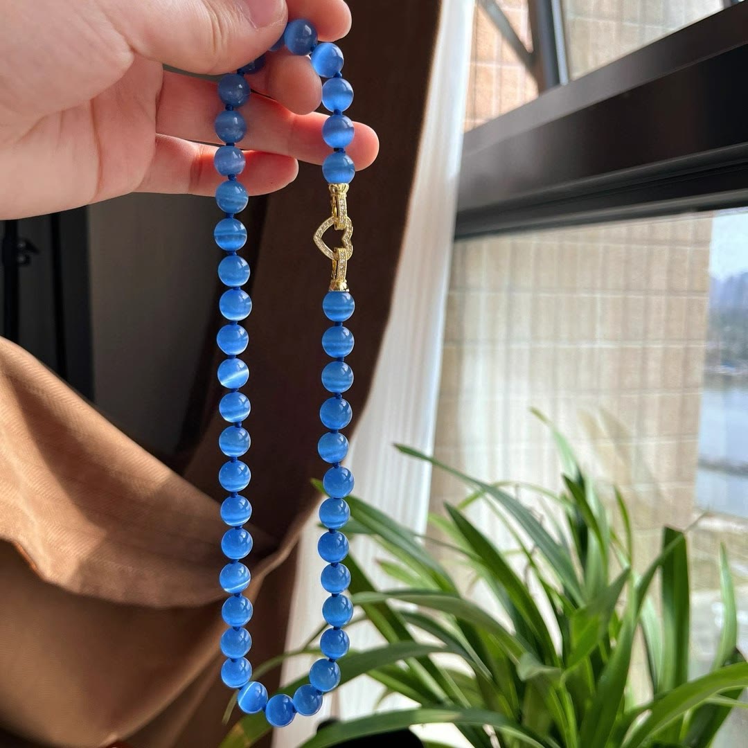 Collier de perles en pierre œil de chat bleu Olivenorma