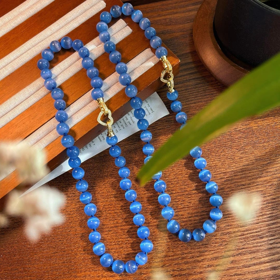 Collier de perles en pierre œil de chat bleu Olivenorma