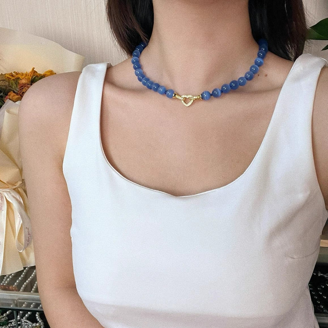 Collier de perles en pierre œil de chat bleu Olivenorma