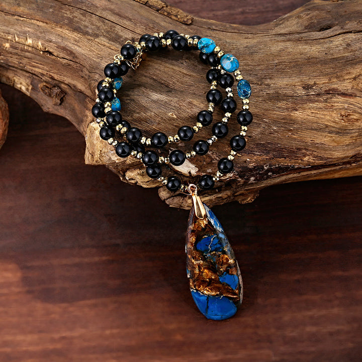 Collier pendentif en obsidienne bleue avec perles d'empereur Olivenorma