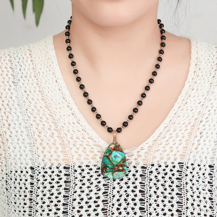 Collier avec pendentif en onyx noir et pierre empereur verte Olivenorma