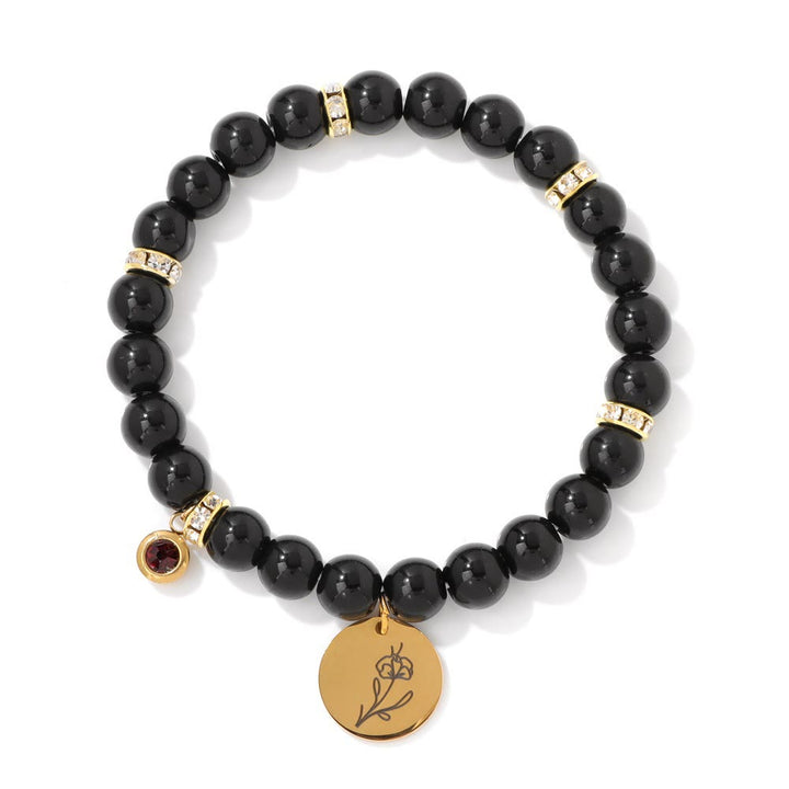 Bracelet Olivenorma en perles d'obsidienne de 8 mm avec fleur de naissance