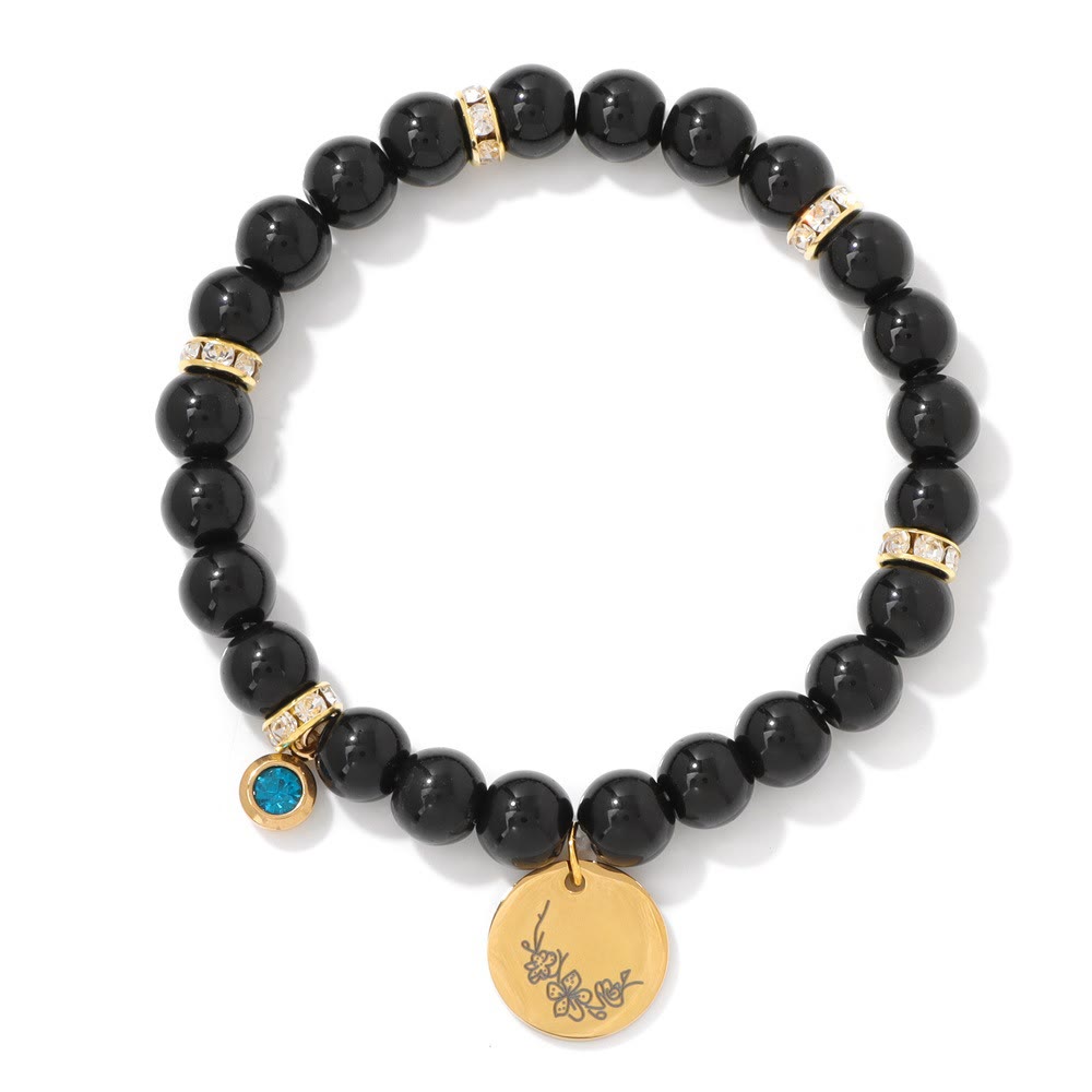 Bracelet Olivenorma en perles d'obsidienne de 8 mm avec fleur de naissance