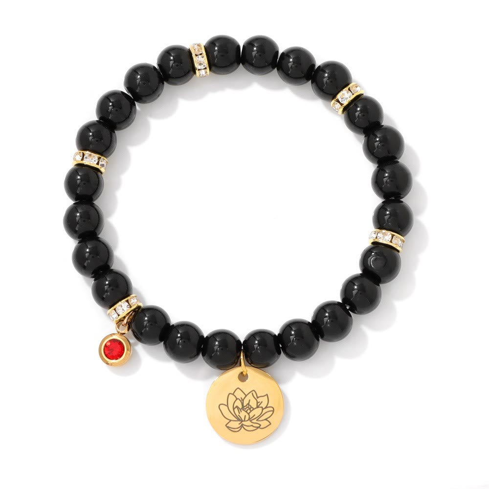 Bracelet Olivenorma en perles d'obsidienne de 8 mm avec fleur de naissance