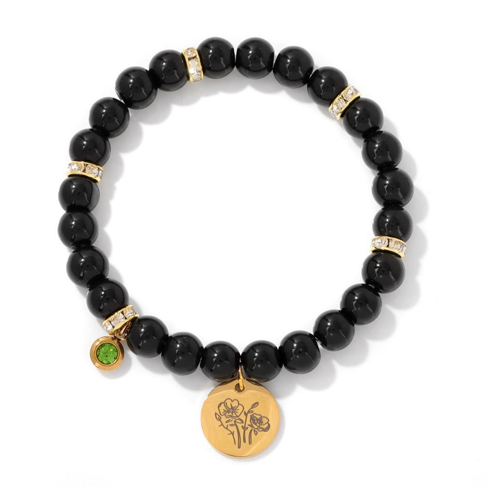 Bracelet Olivenorma en perles d'obsidienne de 8 mm avec fleur de naissance