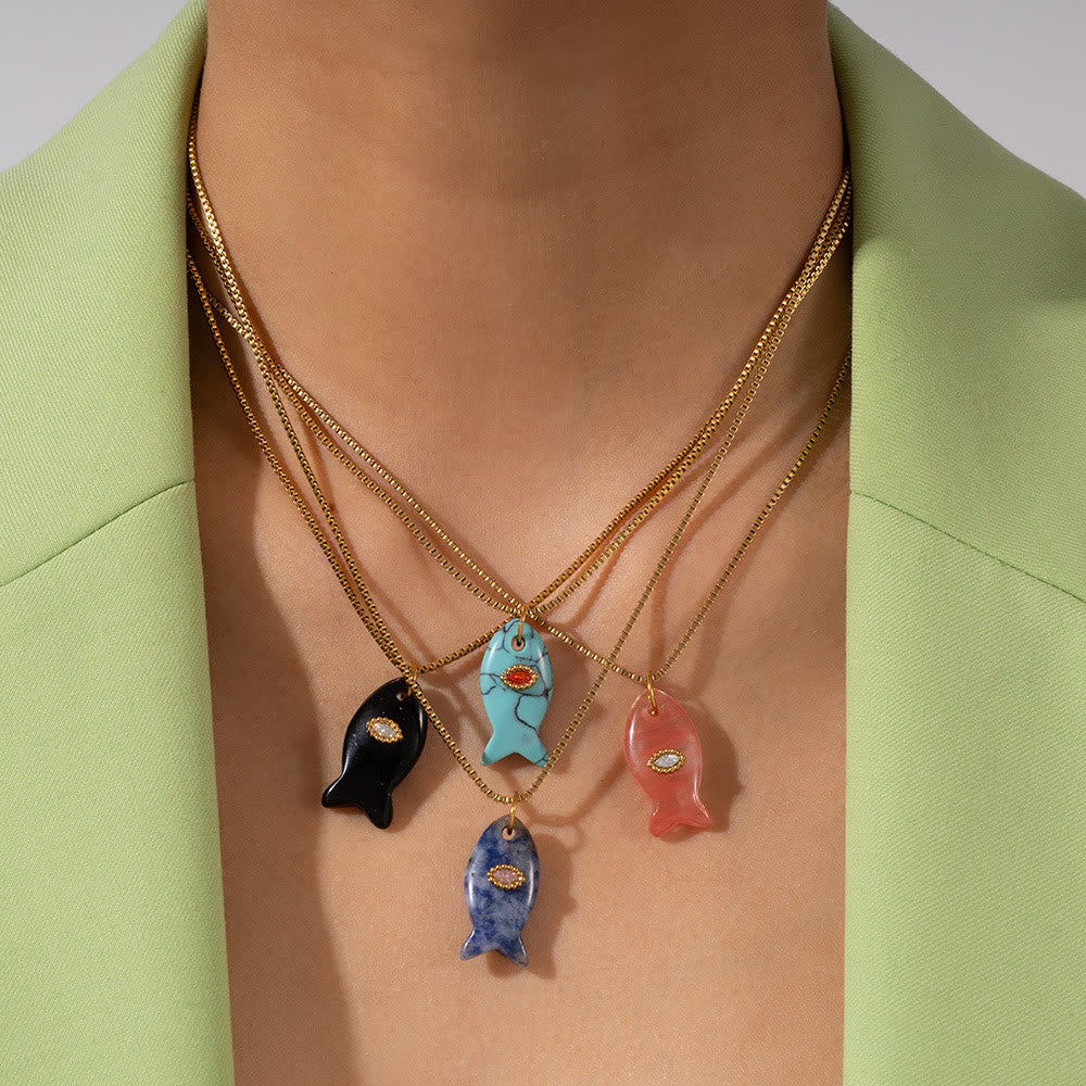 Collier pendentif en forme de poisson taillé en pierre naturelle Olivenorma