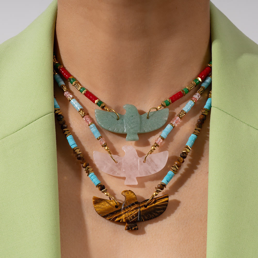 Collier de perles avec pendentif en pierre naturelle sculptée d'aigle Olivenorma