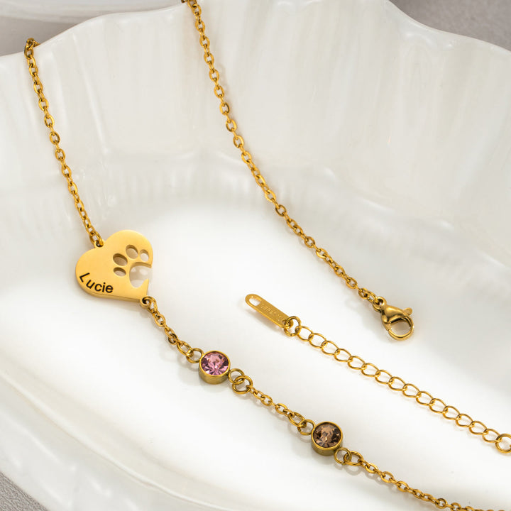 Collier personnalisé Olivenorma avec pierre de naissance en forme de patte de chien et cœur creux