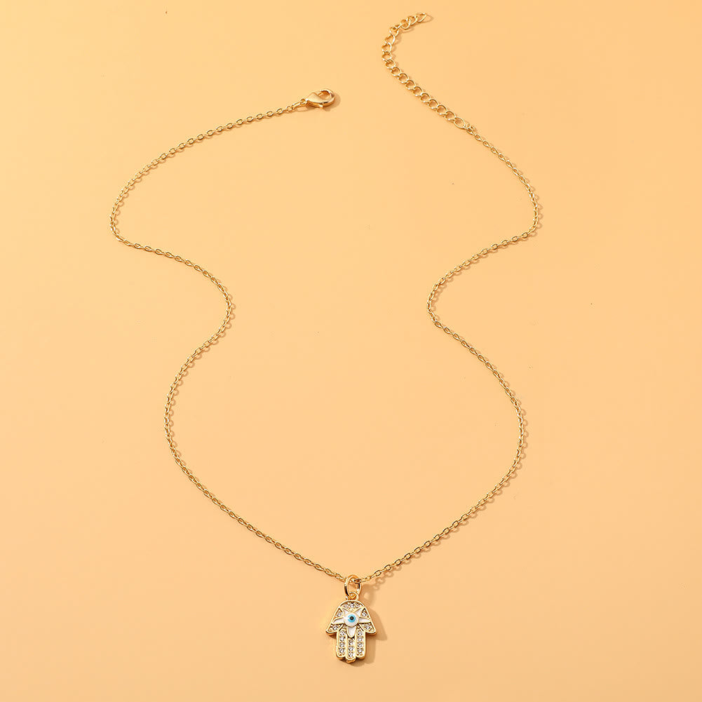 Collier en époxy en forme de cœur avec le mauvais œil Hamsa Olivenorma