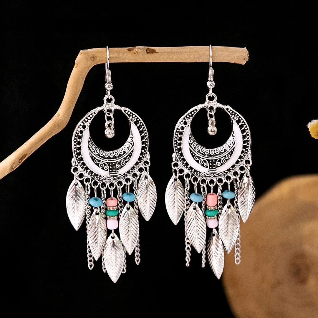 Boucles d'oreilles Olivenorma style ethnique rétro bohème à pampilles turquoise