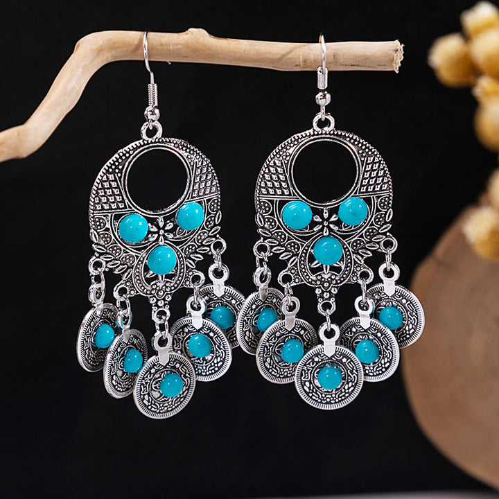 Boucles d'oreilles Olivenorma style ethnique rétro bohème à pampilles turquoise