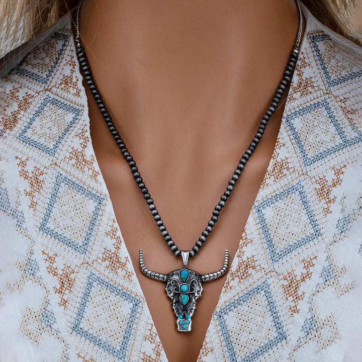 Collier pendentif tête de taureau turquoise en perles de pierre naturelle Olivenorma