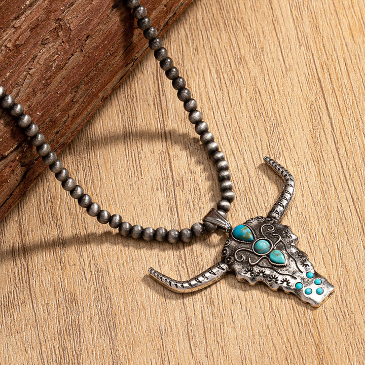 Collier pendentif tête de taureau turquoise en perles de pierre naturelle Olivenorma