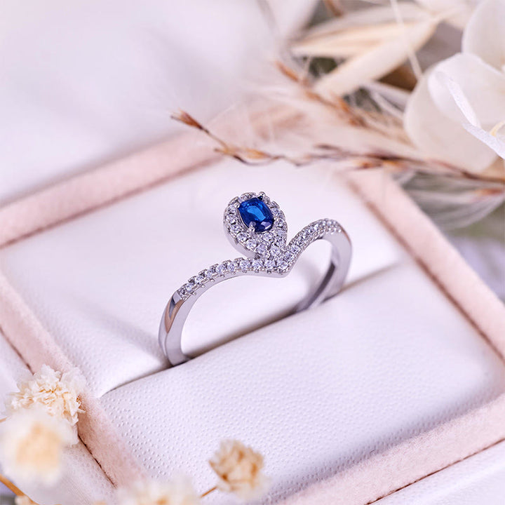 Bague Olivenorma en topaze bleue avec couronne en forme de larme