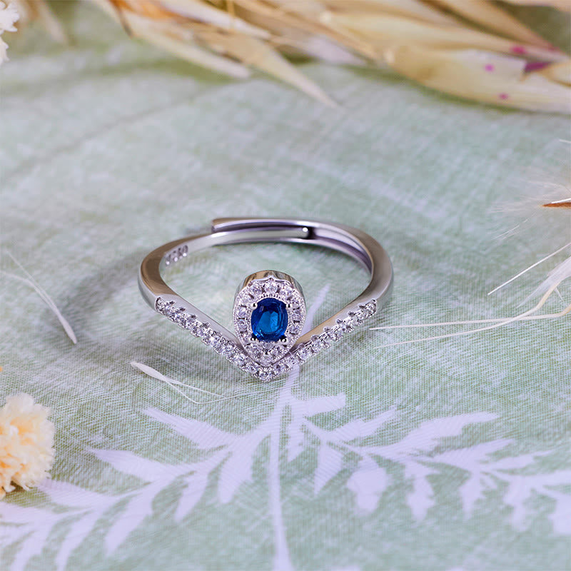 Bague Olivenorma en topaze bleue avec couronne en forme de larme