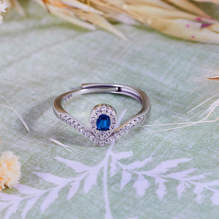 Bague Olivenorma en topaze bleue avec couronne en forme de larme
