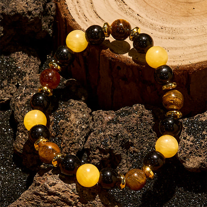 Bracelet de perles d'obsidienne œil de tigre et aventurine jaune Olivenorma