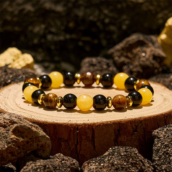 Bracelet de perles d'obsidienne œil de tigre et aventurine jaune Olivenorma