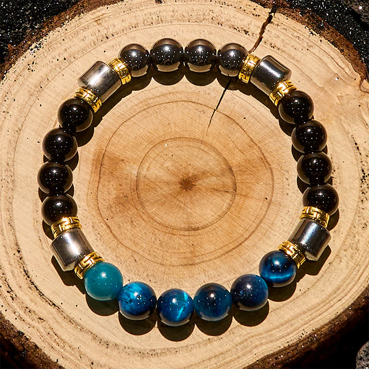 Bracelet Olivenorma en perles d'hématite et d'obsidienne œil de tigre bleu