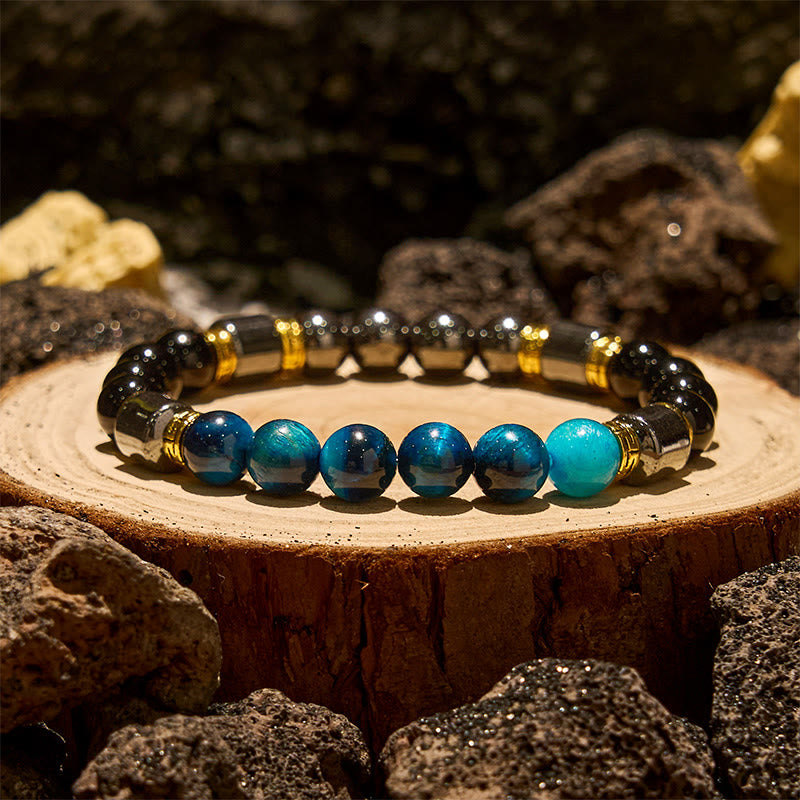 Bracelet Olivenorma en perles d'hématite et d'obsidienne œil de tigre bleu
