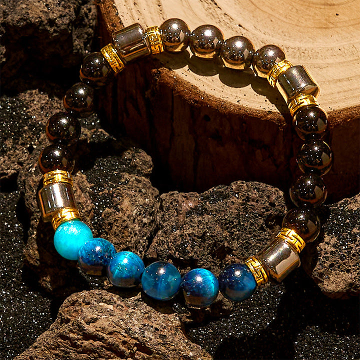 Bracelet Olivenorma en perles d'hématite et d'obsidienne œil de tigre bleu
