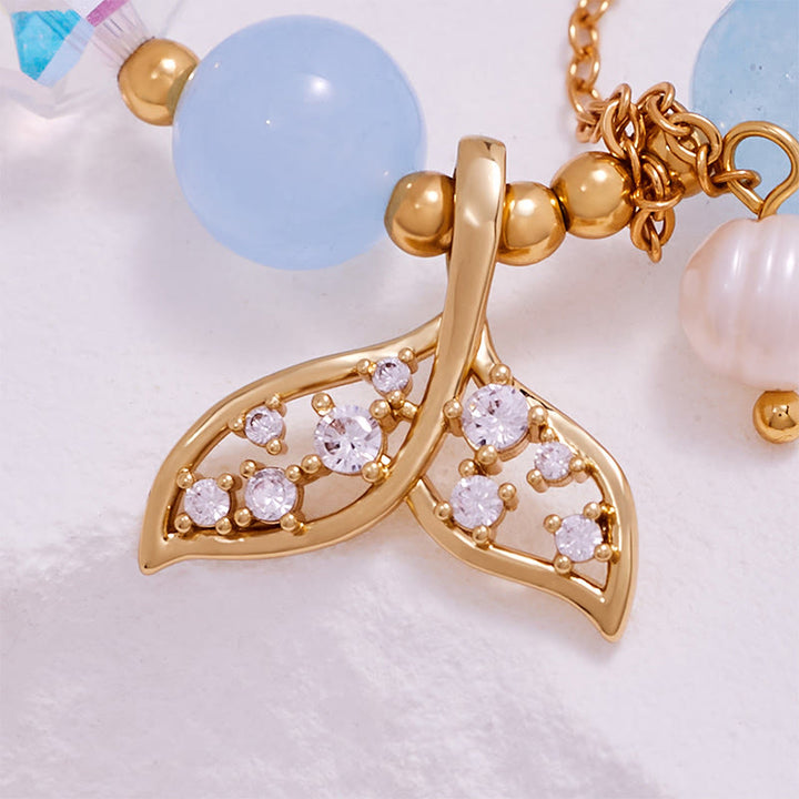 Bracelet queue de baleine en perles de verre transparent aigue-marine Olivenorma