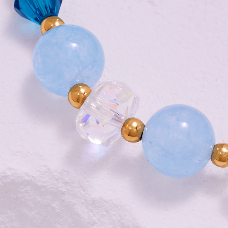 Bracelet queue de baleine en perles de verre transparent aigue-marine Olivenorma