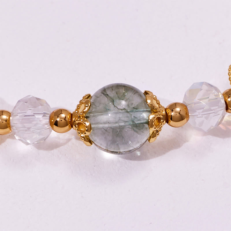 Bracelet Olivenorma en perles de verre transparent et quartz fantôme vert