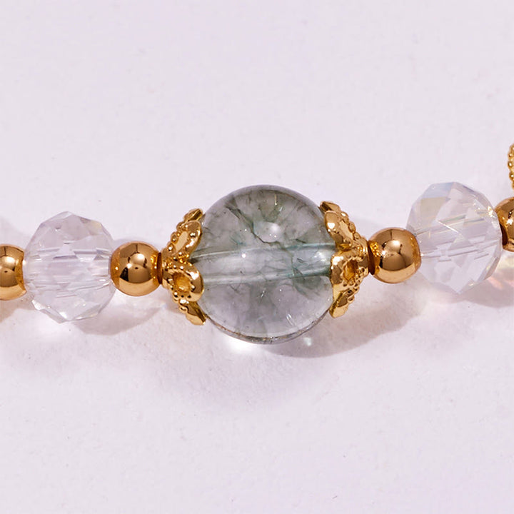 Bracelet Olivenorma en perles de verre transparent et quartz fantôme vert