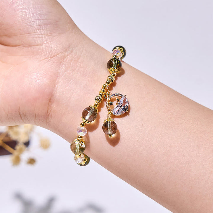 Bracelet Olivenorma en perles de verre transparent et quartz fantôme vert