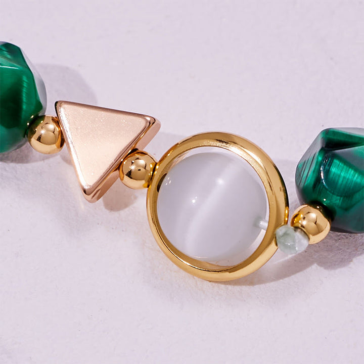 Bracelet en perles d'œil de tigre vert à facettes Olivenorma