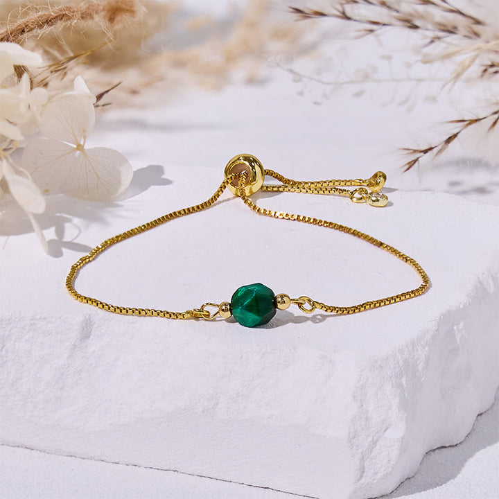 Bracelet en perles d'œil de tigre vert à facettes Olivenorma