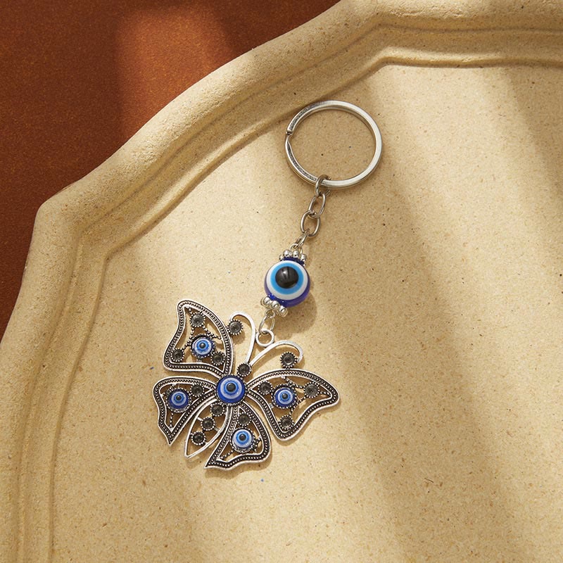 Porte-clés créatif Olivenorma avec mauvais œil bleu et détails animaux/plantes - Papillon-2 - image 6