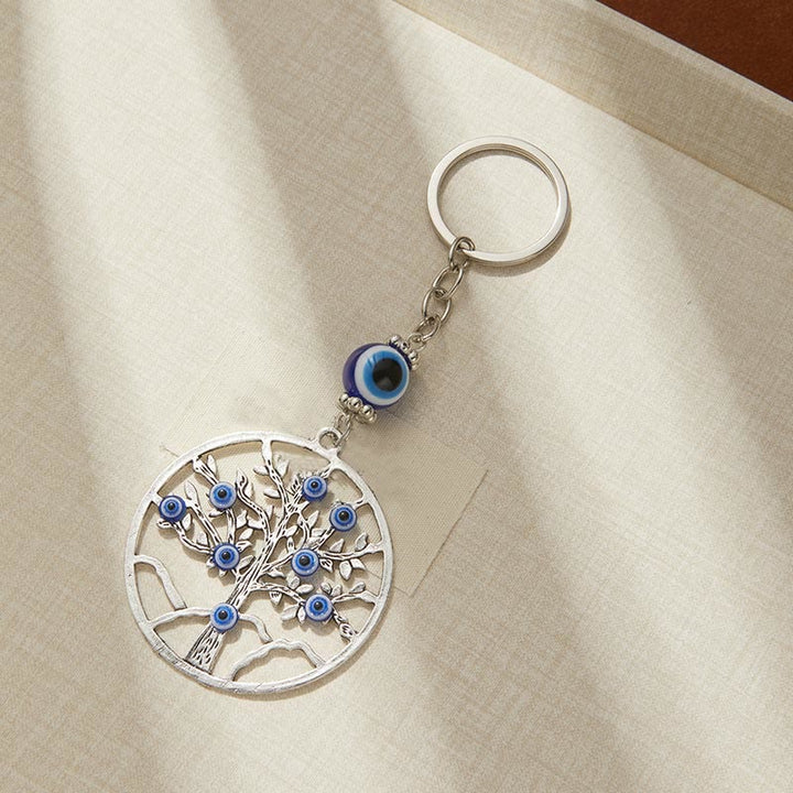 Porte-clés créatif Olivenorma avec mauvais œil bleu et détails animaux/plantes - Fleur - image 3