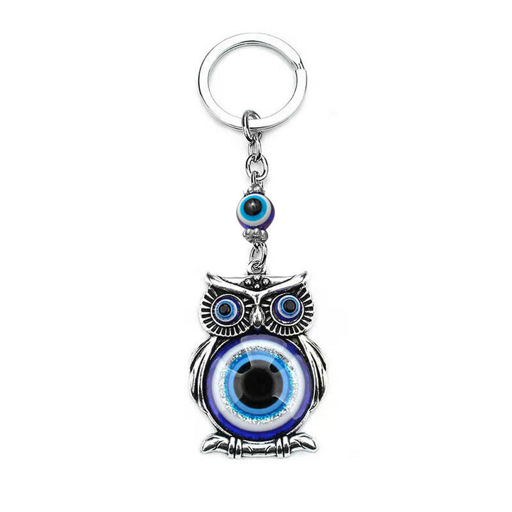 Porte-clés créatif Olivenorma avec mauvais œil bleu et détails animaux/plantes - image 5