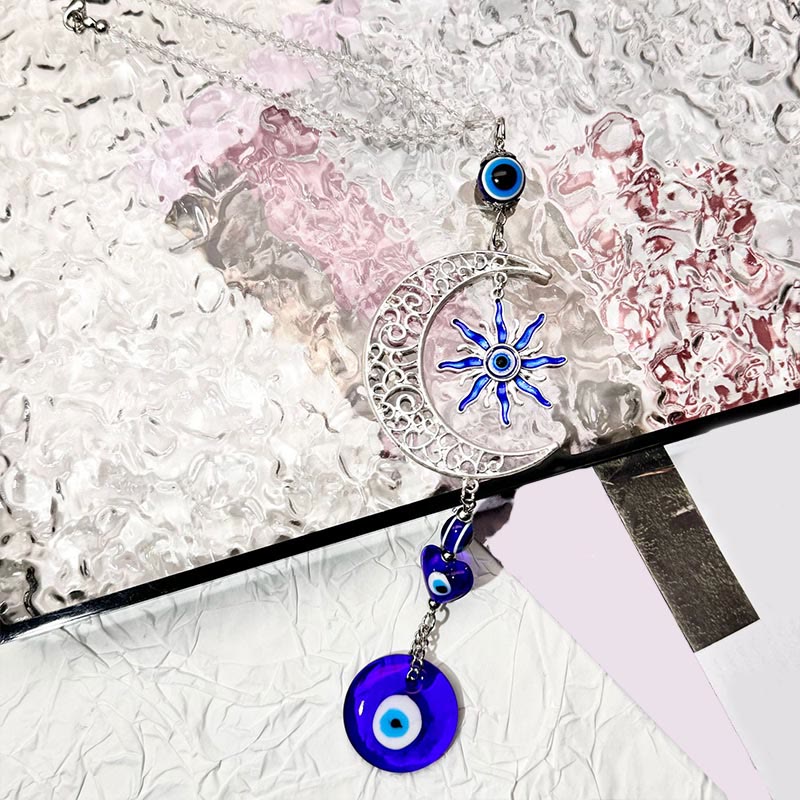 Porte-clés Olivenorma à thème céleste contre le mauvais œil avec lune, soleil et cœur - image 2
